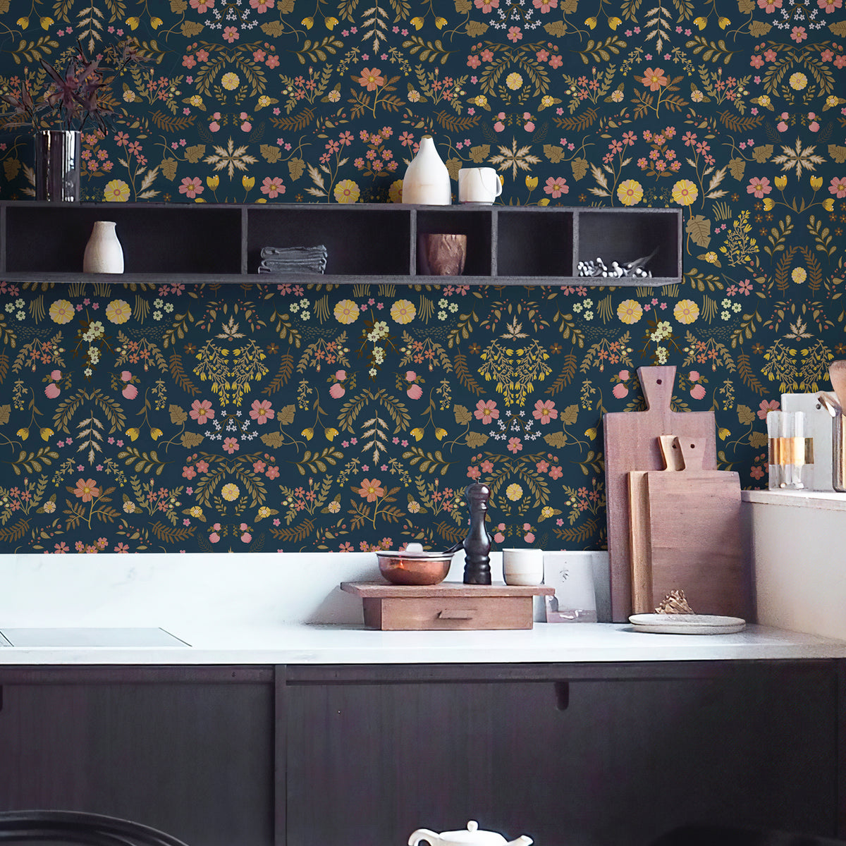 Removable wildflower wallpaper acts as kitchen backsplash behind countertop. It is a stylish, water‑resistant decorative solution for your cooking area.