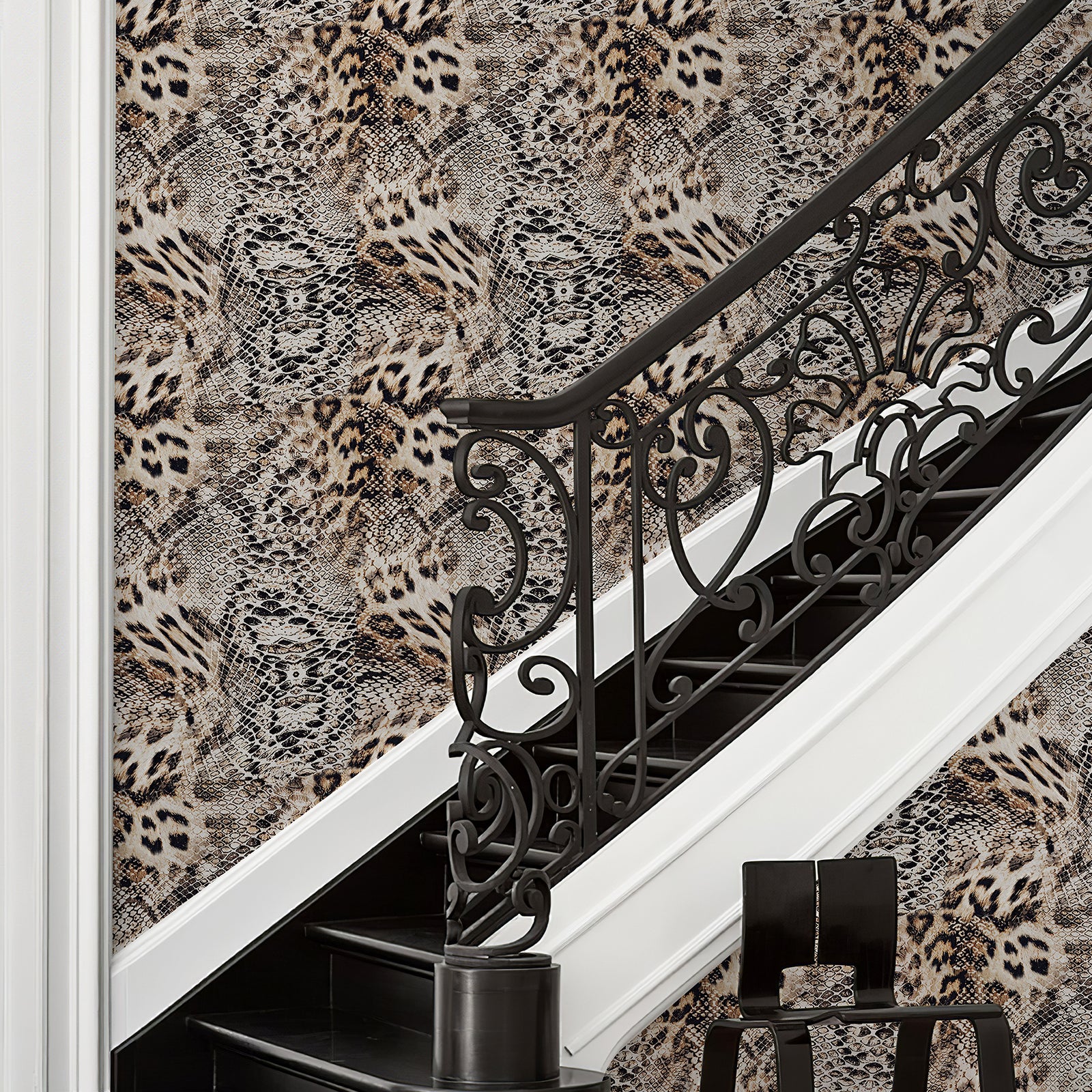 Self-adhesive wallpaper featuring leopard and snakeskin patterns, used to decorate staircase walls.