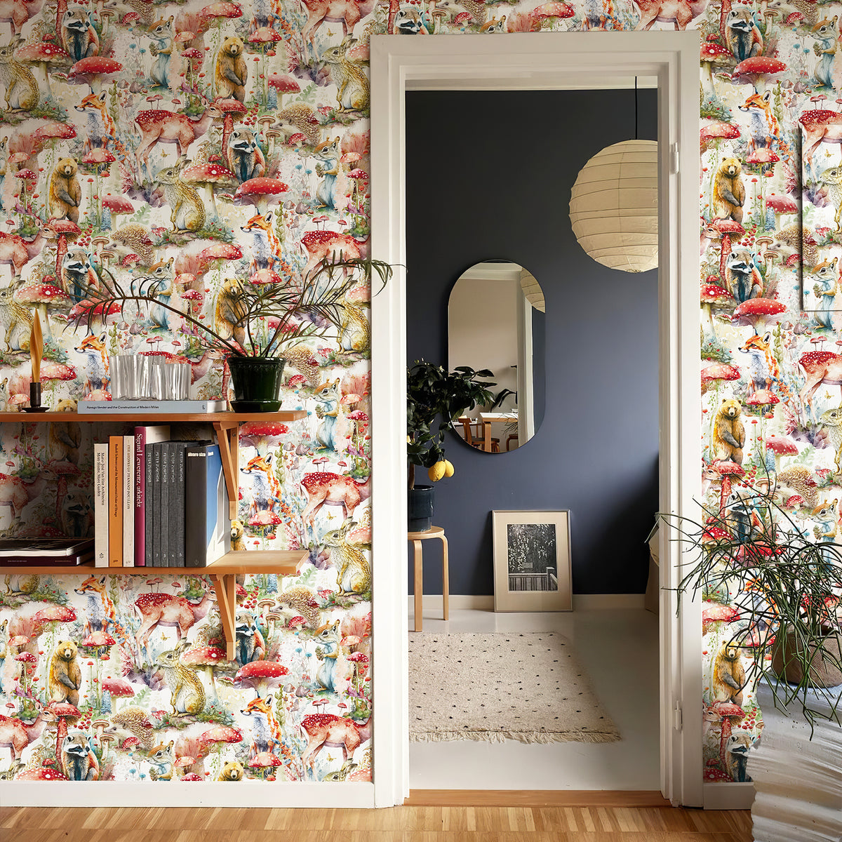 Whimsical forest animal wallpaper covers both sides of the hallway doorway, paired with floating wooden bookshelves, forming a magical woodland‑themed entry passage.